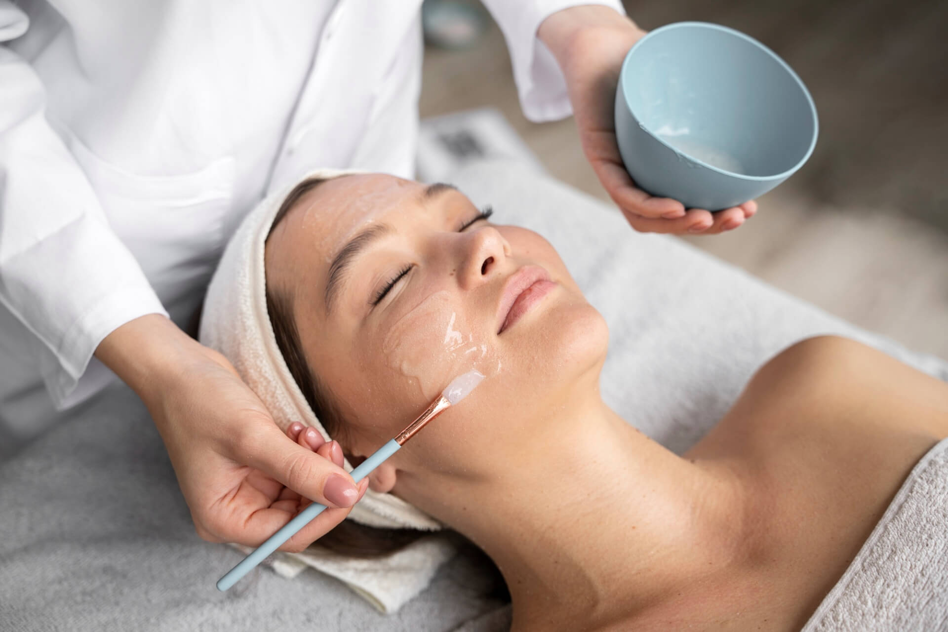 Woman having a facial treatment in clinic